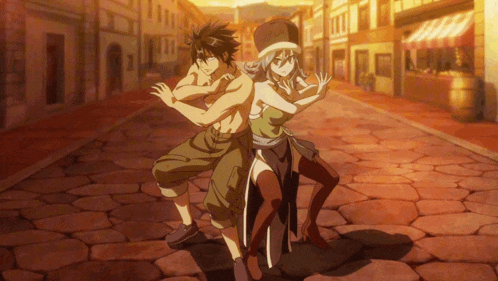 a man and a woman are standing next to each other on a street