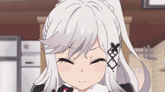 a girl with gray hair has a cross on her ear