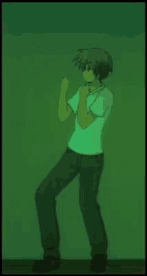 a man in a white shirt and black jeans is dancing in a dark room .