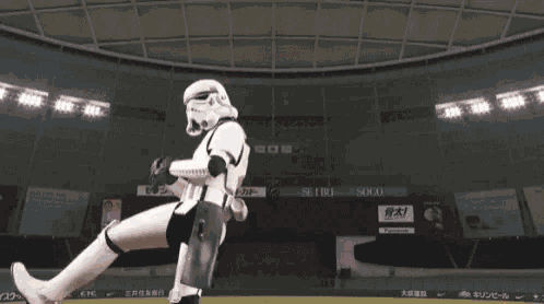 a storm trooper is throwing a baseball in a stadium with an ad for sogo