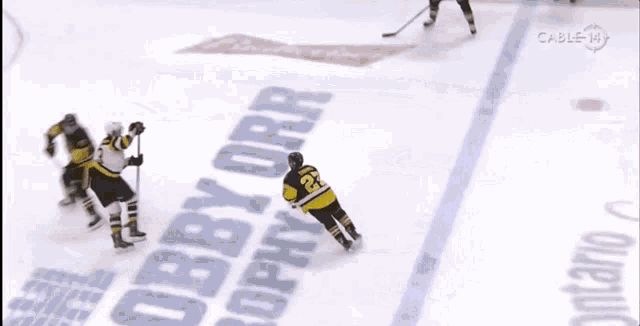 a hockey game is being played in front of an advertisement for josephs
