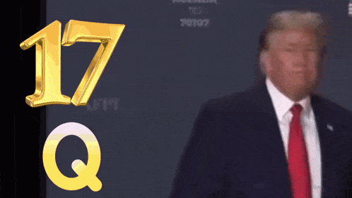 a man in a suit and tie stands in front of a sign that says agenda to 70107