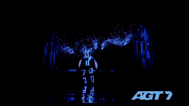 a group of people are standing in a line with the word act 7 in the bottom right corner