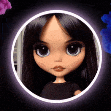 a doll with dark hair is in a circle