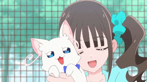 a girl holding a white cat with blue eyes and a bow in her hair