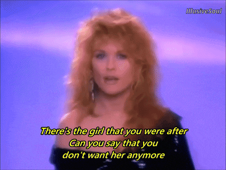 a woman singing a song with the words " there 's the girl that you were after "