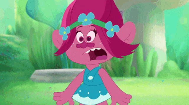 a troll with pink hair and blue flowers on her hair