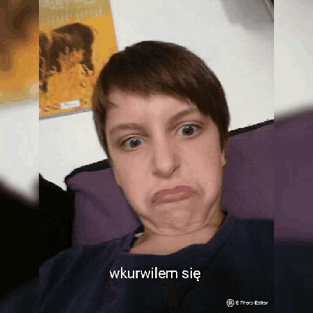a woman is making a funny face and the words wkurwilem sie are on the bottom