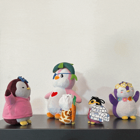 a group of stuffed animals are on a shelf under a sign that says say cheese