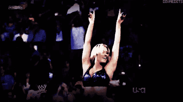 a woman is dancing in front of a crowd and the words divaedits are on the bottom