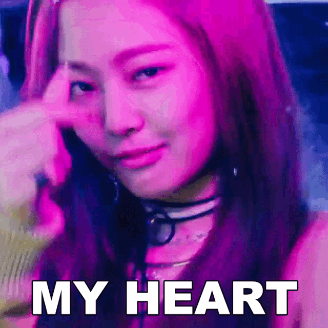 a close up of a woman with purple hair and the words my heart