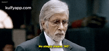 a man with a beard and glasses says no simply means no