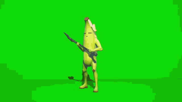 a banana is dancing on a green screen with its hands in the air .