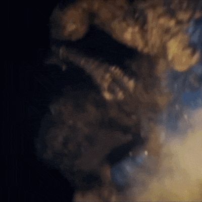 a close up of a smoke filled room with a dark background .