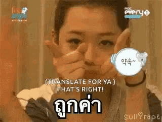 a woman is making a funny face with her hands and says translate for ya that 's right !