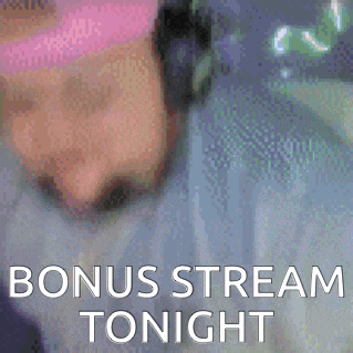 a blurry picture of a person with the words `` bonus stream tonight '' written above them .