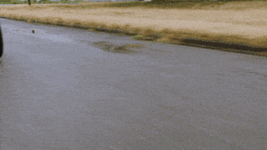 a person riding a motorcycle on a road