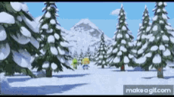 a video of a snowy forest with a mountain in the background