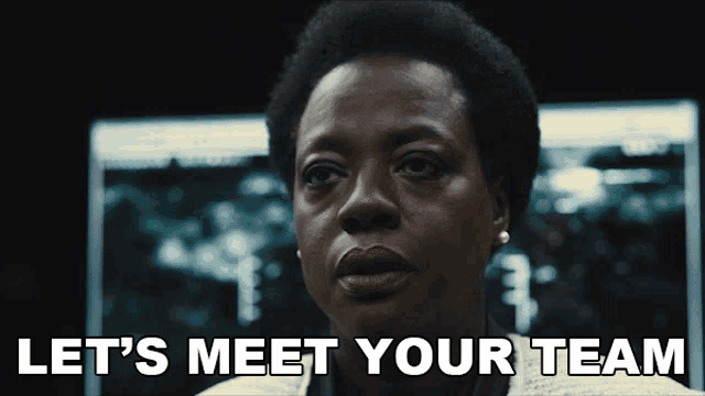 a woman says let 's meet your team in front of a computer screen