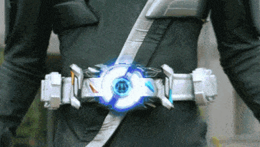 a person is wearing a belt with a blue light coming out of the center