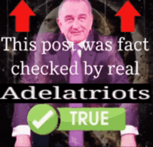 a man in a suit and tie is standing in front of a green check mark that says true