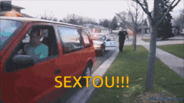 a red van is driving down a street with the words sextou in yellow