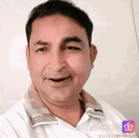 a man in a white shirt is smiling with a starmaker app displayed in the corner