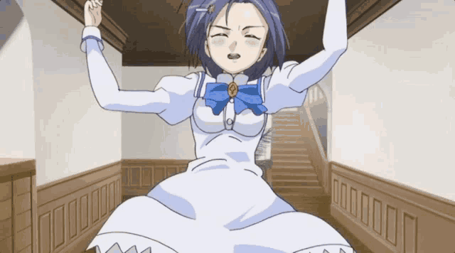a girl in a white dress and blue bow is dancing