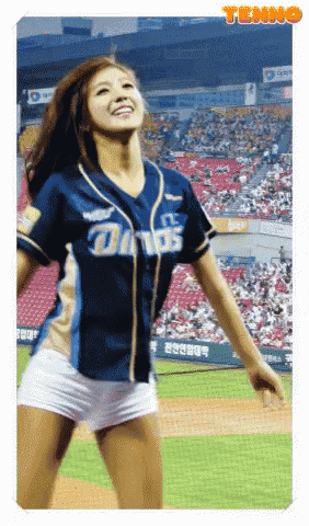 a cheerleader is wearing a jersey that says ' darts ' on the front