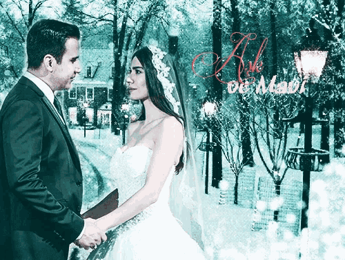 a bride and groom are holding hands in front of a sign that says ' aşk ve mavi '