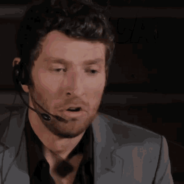 a man with his mouth open and the word holy written on his face