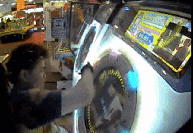 a woman is playing a video game with a screen that says 18:05