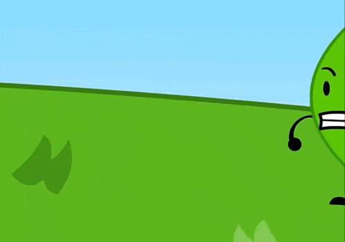 a green cartoon character is standing in the grass with a microphone in his mouth .