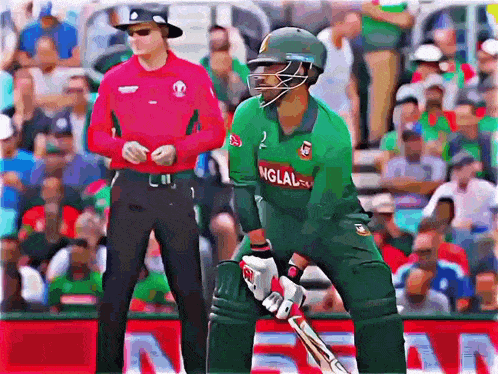 a cricket player in a green uniform with the number 2 on the front