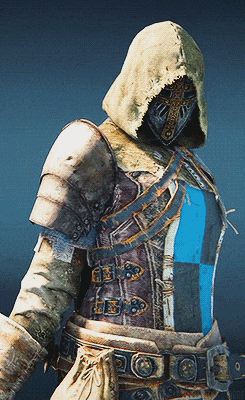 a person wearing a hooded jacket with a mask on