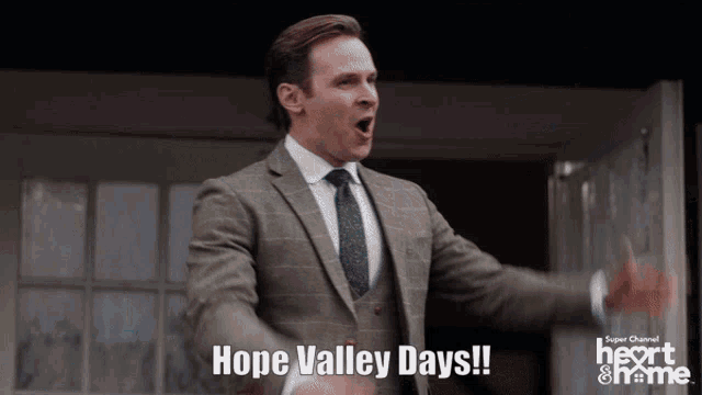 a man in a suit and tie is shouting hope valley days