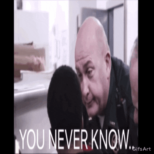 a police officer is talking to a man with the words " you never know " on the bottom