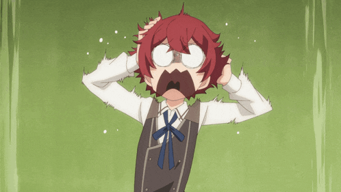 a boy with red hair and glasses holds his head