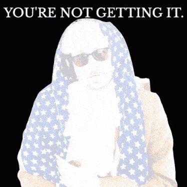 a man in an american flag costume with the words " you 're not getting it " above him