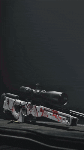 a picture of a sniper rifle with a dragon on it