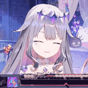 a girl with a crown on her head is smiling with her eyes closed