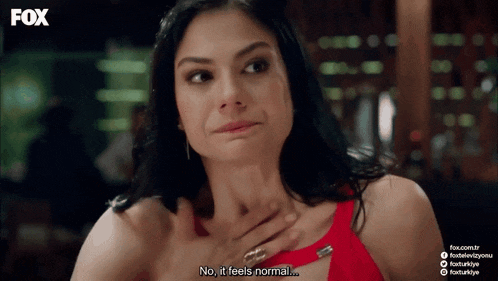 a woman in a red dress says " no it feels normal " in a fox advertisement