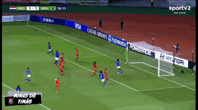 a soccer game is being played between the netherlands and bra