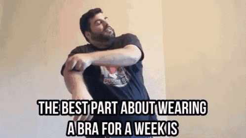 a man with a beard is wearing a black shirt that says puddy dog on it