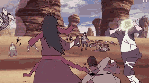 a group of people are standing in a desert fighting each other .