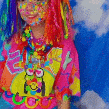a girl with colorful hair and face paint is wearing a colorful shirt and necklaces .