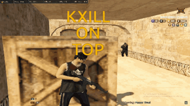a man holding a gun in front of a wall that says kkill on top
