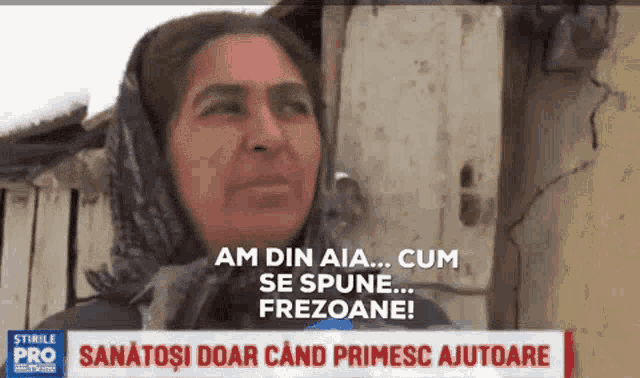 a woman with a scarf on her head is talking on a tv channel