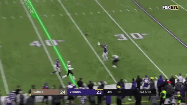 a football game is being played between the vikings and saints