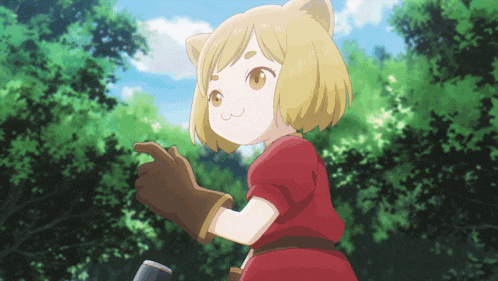 a little girl with a cat ear on her head is wearing a red dress